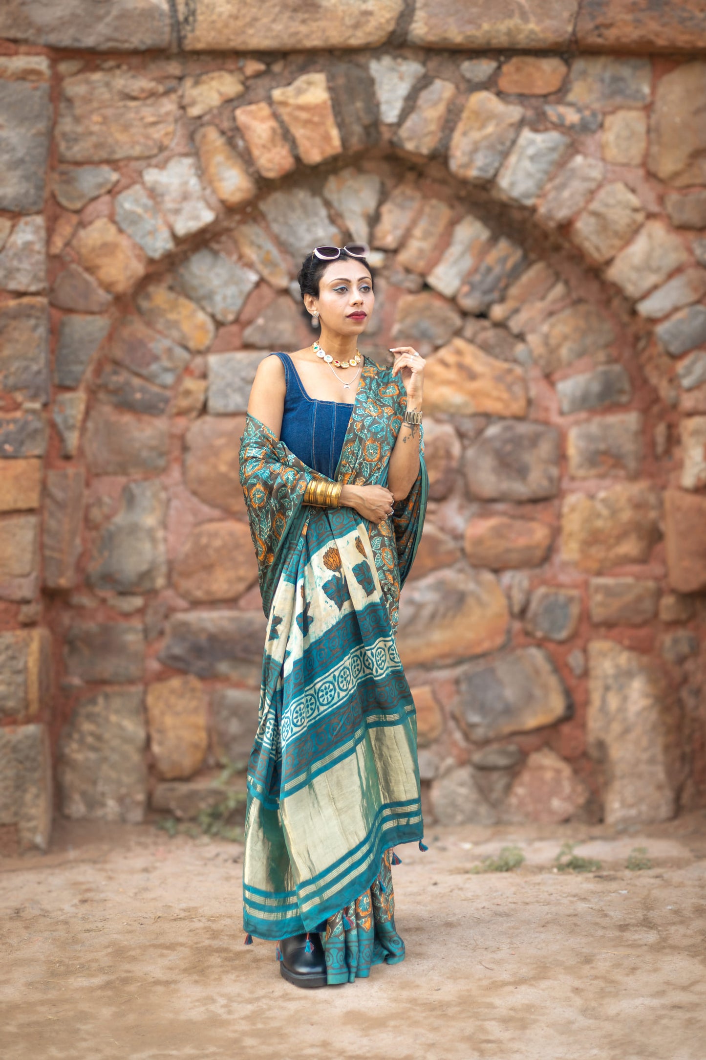 Modal silk saree with heavy Zari Pallu (Dull black saree with Blue & orange colour patterns)