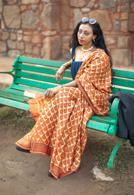 Modal silk saree with heavy Zari Pallu (Dusty Orange)