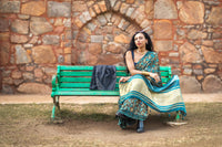 Modal silk saree with heavy Zari Pallu (Dusty Black saree with Blue & mustard colour patterns)
