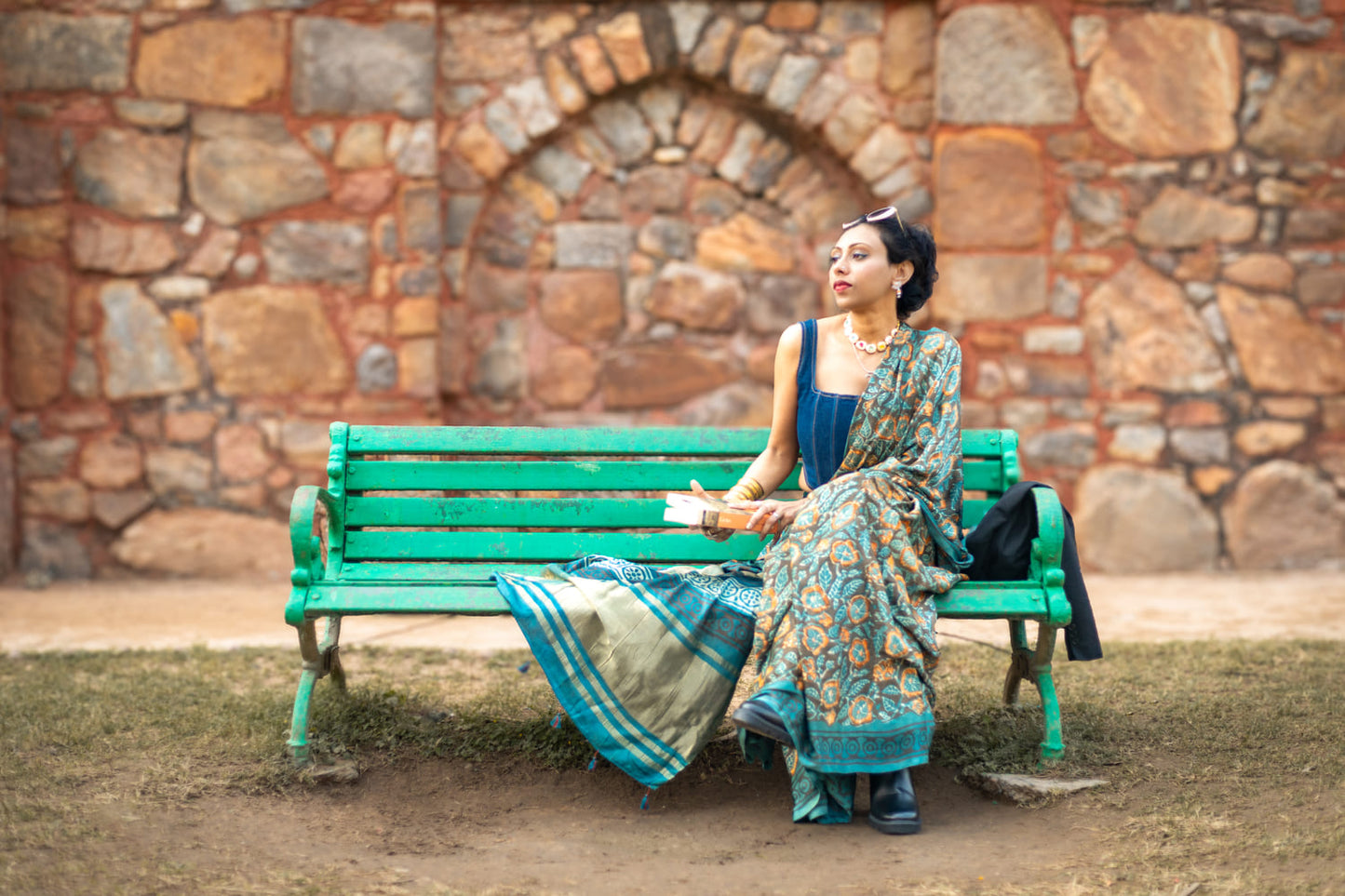Modal silk saree with heavy Zari Pallu (Dull black saree with Blue & orange colour patterns)