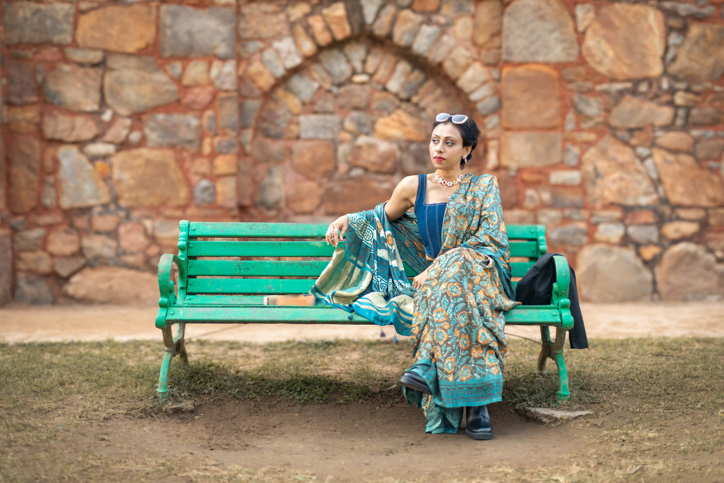 Modal silk saree with heavy Zari Pallu (Dull black saree with Blue & orange colour patterns)