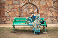 Modal silk saree with heavy Zari Pallu (Dull black saree with Blue & orange colour patterns)