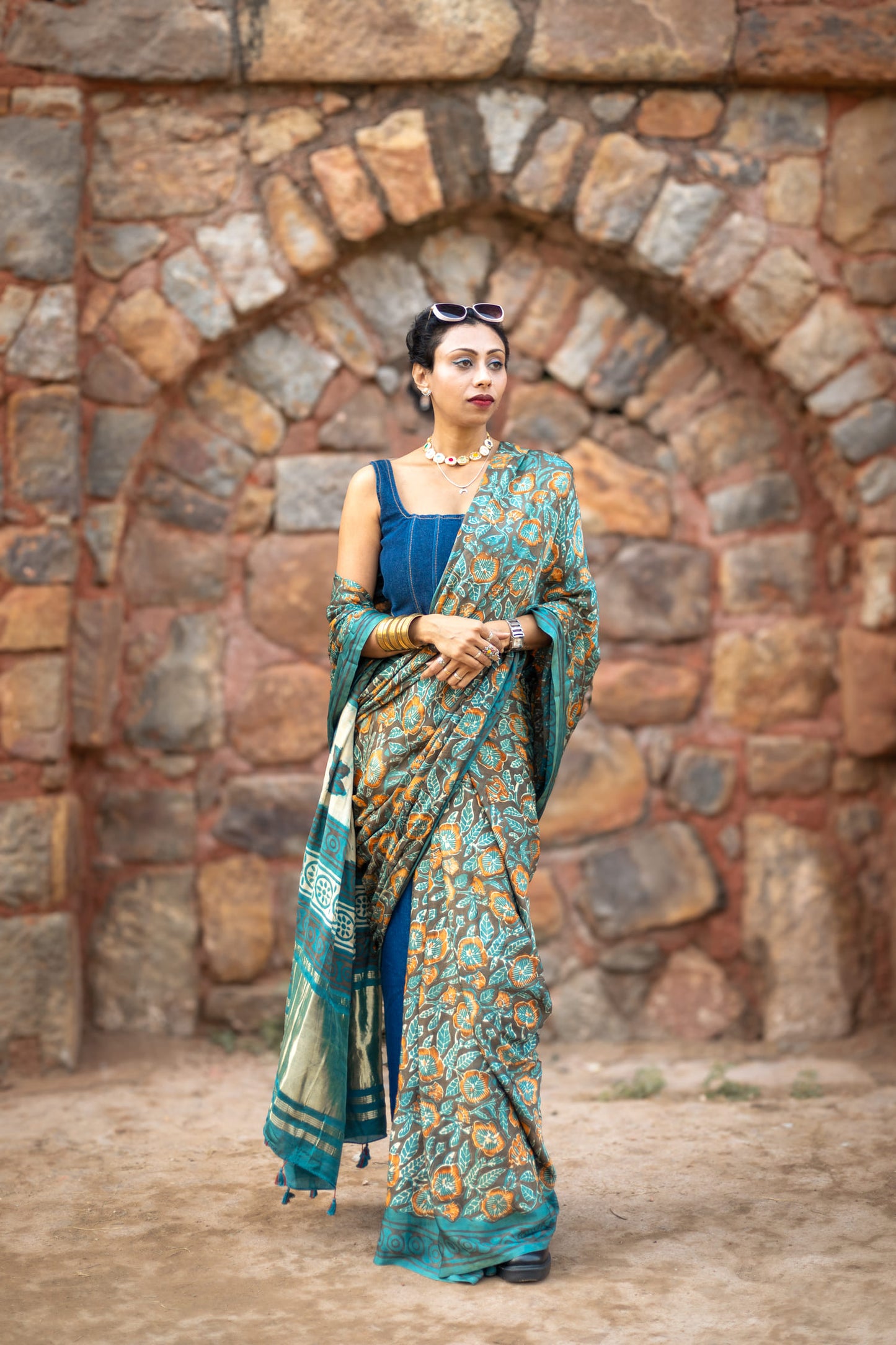 Modal silk saree with heavy Zari Pallu (Dull black saree with Blue & orange colour patterns)