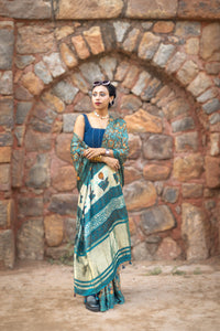 Modal silk saree with heavy Zari Pallu (Dull black saree with Blue & orange colour patterns)
