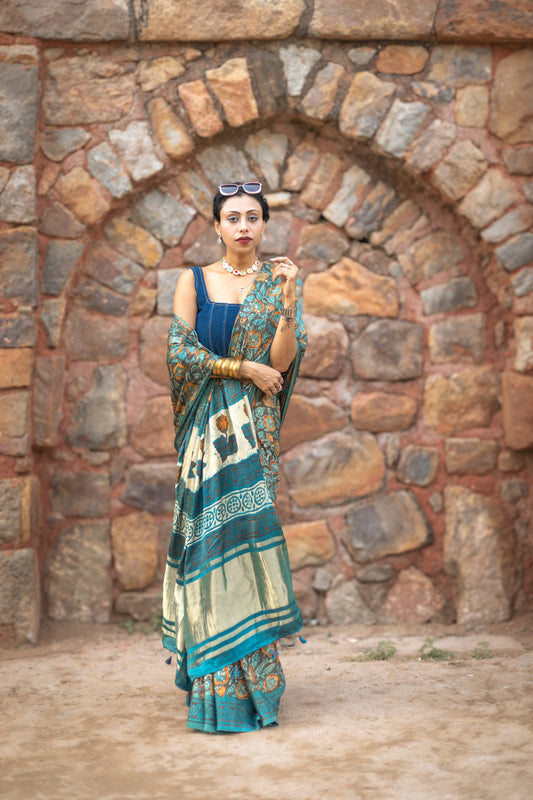 Modal silk saree with heavy Zari Pallu (Dull black saree with Blue & orange colour patterns)