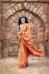 Modal silk saree with heavy Zari Pallu (Dusty Orange)