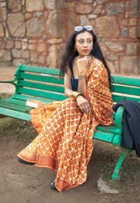 Modal silk saree with heavy Zari Pallu (Dusty Orange)