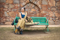 Modal silk saree with heavy Zari Pallu (Earthy yellow saree with Brown & yellow colour patterns)
