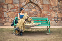 Modal silk saree with heavy Zari Pallu (Earthy yellow saree with Brown & yellow colour patterns)