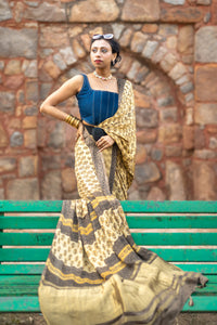 Modal silk saree with heavy Zari Pallu (Earthy yellow saree with Brown & yellow colour patterns)